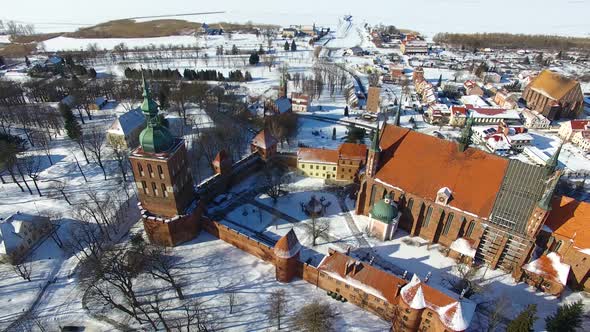 Aerial: Castle of Frombork in Poland, wintertime