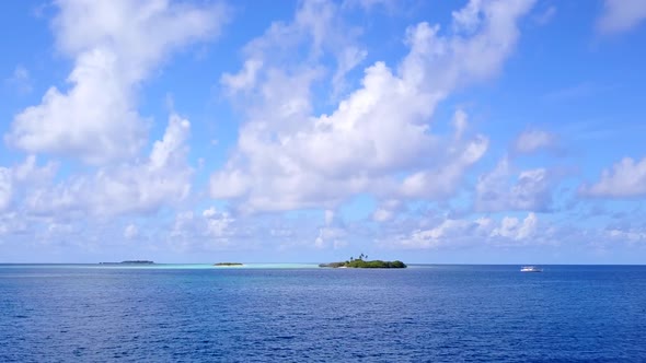 Drone aerial seascape of coastline beach by lagoon and sand background