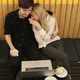 Loving Couple Sitting in Drinking Coffee Enjoying Time Together - VideoHive Item for Sale