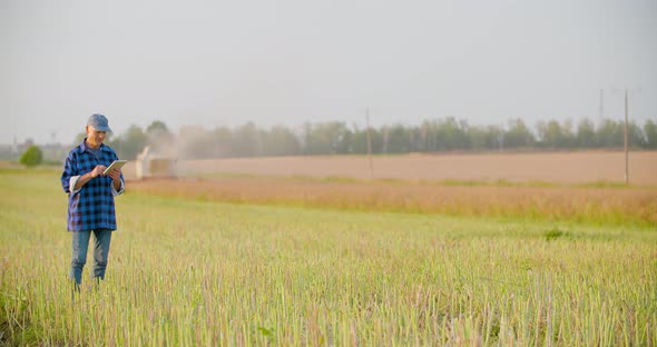 Farmer Using Digital Tablet Agriculture