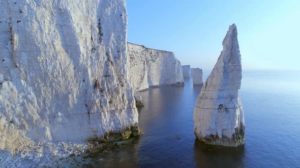 Flying Through Eroded Chalk Cliffs at Old Harry Rocks in England