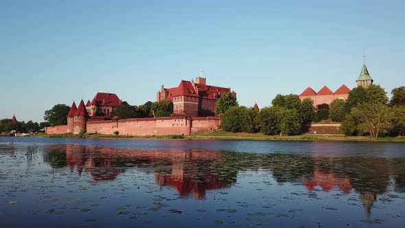 Aerial: The Castle of Malbork in Poland, summer time