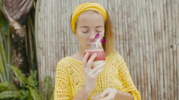 Portrait of Beautiful Woman on Vacation Enjoy Fruitshake