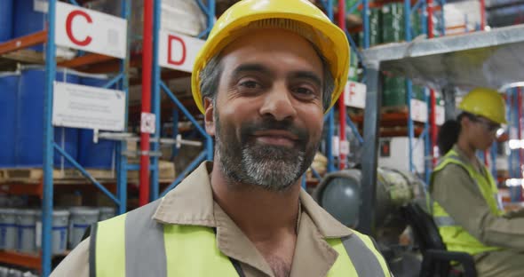 Middle aged male worker in a warehouse