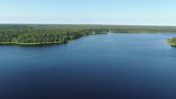 Flight Over the Taiga Forest Lake