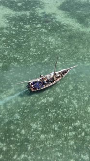 Vertical Video Boats in the Ocean Near the Coast of Zanzibar Tanzania