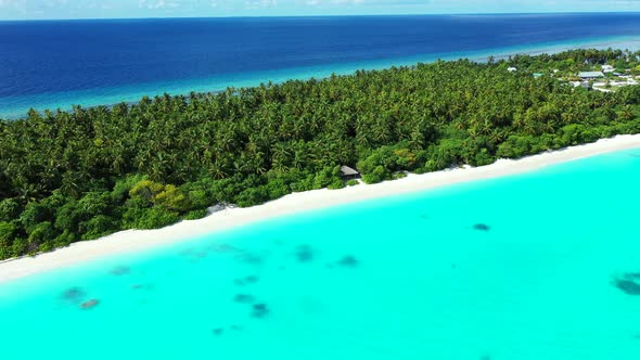 Beautiful aerial copy space shot of a white paradise beach and turquoise sea background in high reso