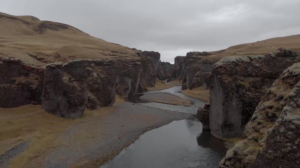 Cinematic aerial fly through of stunning Icelandic canyon.