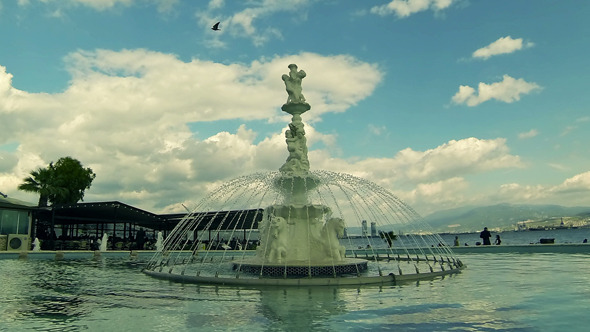 Statue and Clouds