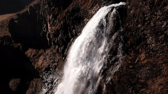 Drone Towards Flowing Water of Rjukandafoss Waterfall