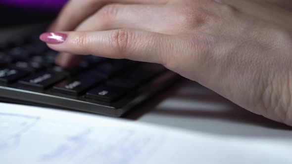 Macro Footage of Woman Hands with Manicure Working at Office and Typing on Keyboard