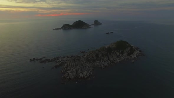 View From a Drone to a Beautiful Island in the Triozerie Bay at Sunrise