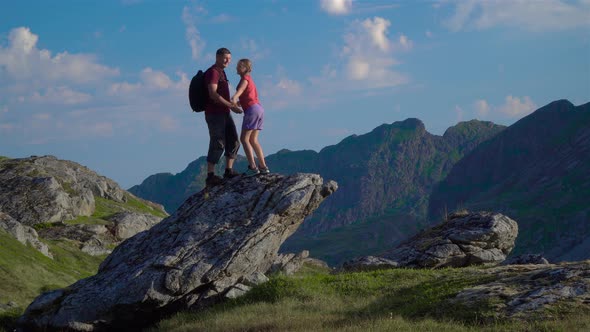 Father and Daughter Are Traveling in the Mountains