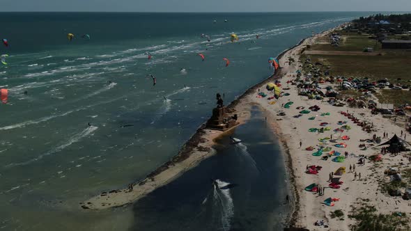 Colorful Kites Flying Air Over Sea People Kitesurfing