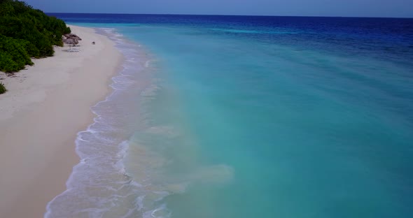 Luxury overhead clean view of a summer white paradise sand beach and blue ocean background