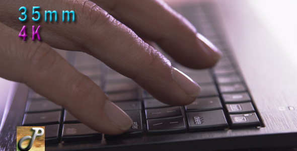 Man Hands Typing On a Computer Keyboard