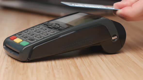 Payment By Credit Card By Contactless NFC Technology Using Pos Terminal