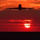 Silhouette of Large Passenger Airplane Taking off against Orange Sunset - VideoHive Item for Sale