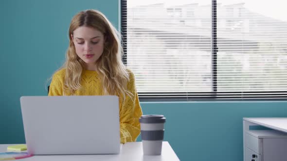 Caucasian woman working on computer