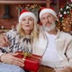 Happy Old Couple Presenting Gift on Christmas Video Call Webcam View - VideoHive Item for Sale