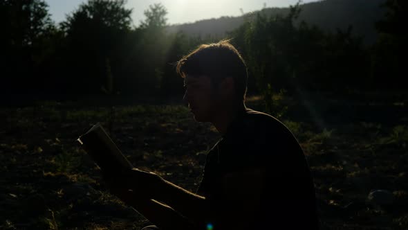 Silhouette Young Man Reading Quran