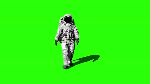 Astronaut Walking on the Green Screen and Saluting. alt