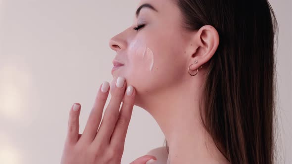 Facial Care Skin Moisturizing Woman Applying Cream