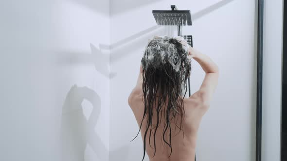 Female Showering in Bathroom