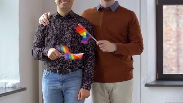 Male Couple with Gay Pride Rainbow Flags at Home 6