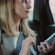 Beautiful Woman Typing on Her Smartphone in the Car - VideoHive Item for Sale