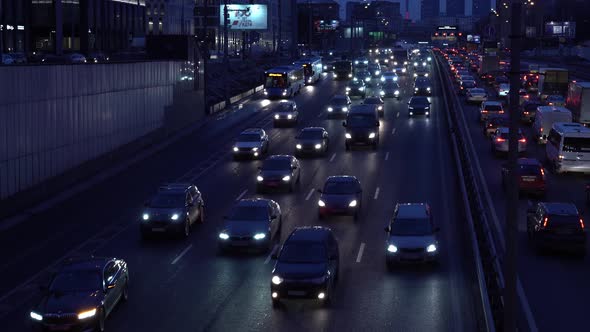 Raffic at Night in the City City Traffic on a City Street