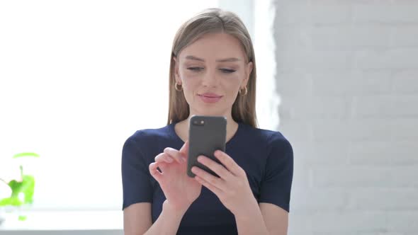 Portrait of Woman Using Smartphone Internet