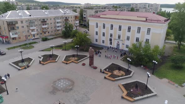 Aerial view of Kids are playing at Square near the house of Culture 15