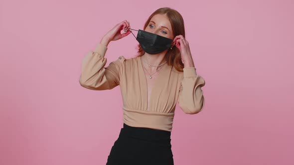 Young Smiling Woman Happily Taking Off Medical Mask and Throws It Away Celebrating Coronavirus End