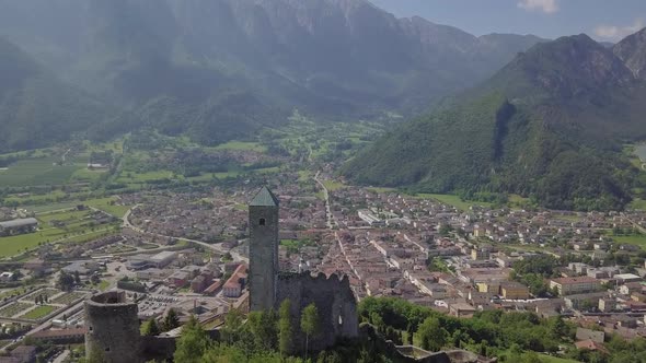 Aerial panoramic view of Borgo Valsugana in Trentino Italy with views of the city and mountains, dro