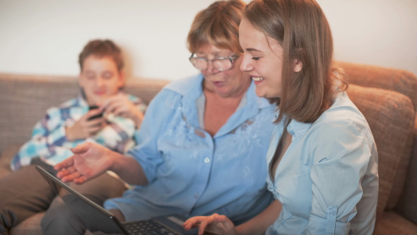 Teenager and Old Persons Learn Laptop alt