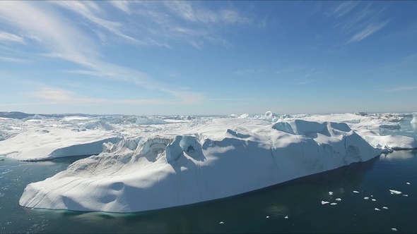 Climate change. Melting glaciers and icebergs in the ocean. Unesco World Heritage Site.