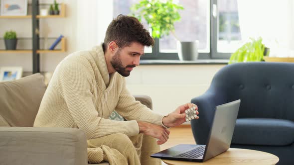 Sick Man with Medicine Having Video Call on Laptop