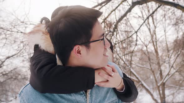 Newlywed Asian Couple Having Fun Outside on Valentines Day