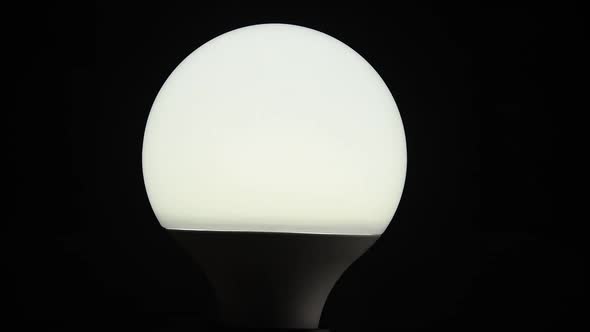 Electric Modern Led Lamp Flashing on a Black Background