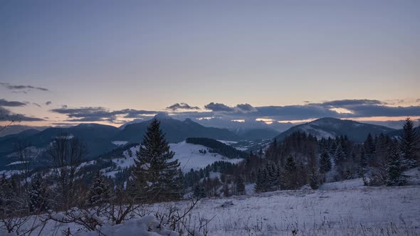 Winter landscape at sunset, dusk, colorful sky