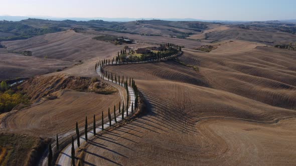 Cypress Trees Road and Farmhouse in Tuscany Hills