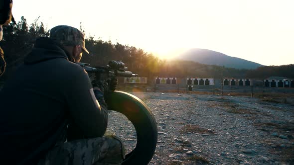 A military specialist from a special forces unit shoots at a tactical range from the AR-15