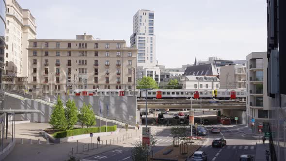 Train passing by the European Union quarter of Brussels, Belgium. Concept of city life and transport