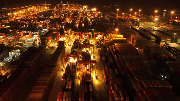 Aerial footage of Yantian international container terminal at night in Shenzhen city, China