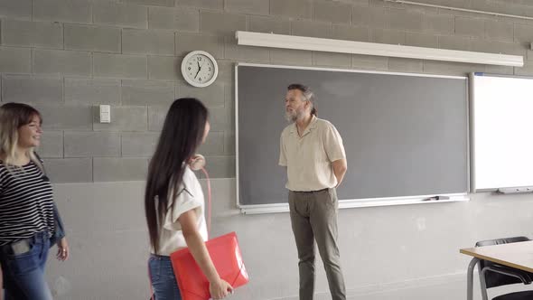 Back to Class with the Young Students Entering the Classroom