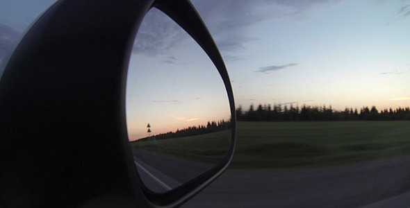 Reflection In Car Mirror