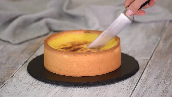 Cutting French custard pie, parisian flan.