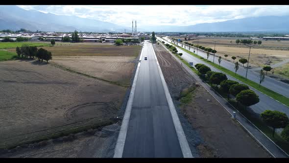 Panorama Aerial View of Small Town Near Road Highway