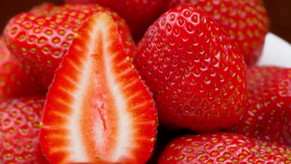 Strawberries close-up, macro. Berries rotate on their axis.